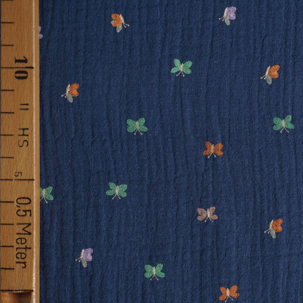 Musselin Double Gauze kleine bunte Schmetterlinge auf blau